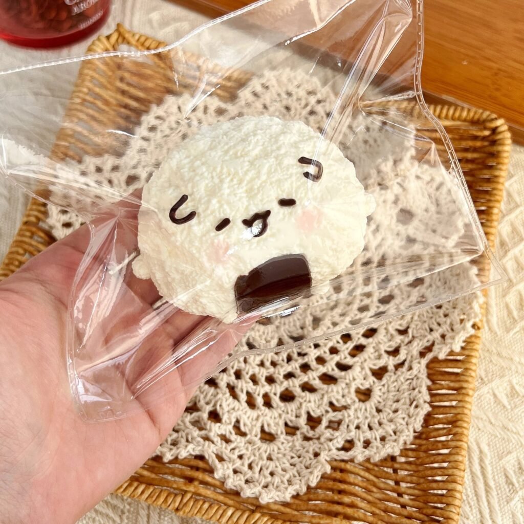 89127 Kaka Jiang Squishy Rice Ball Baby - Chocolate (Dry Cheese Clay Texture Series) / 咔咔酱捏捏 饭团宝宝（巧克力）（干奶酪触感系列）